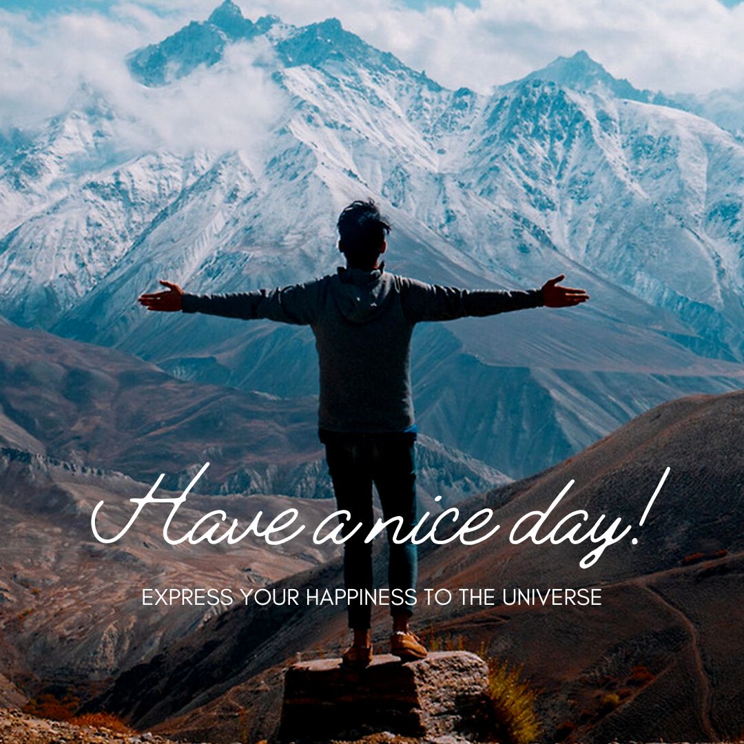 A person stands on a rock with arms outstretched, facing a majestic mountain range covered in snow. The sky is clear with a few clouds. The text reads "Good Morning! Express your happiness to the universe and have a nice day!