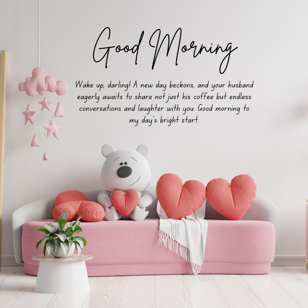 A cozy scene with a pink sofa adorned with heart-shaped pillows and a stuffed bear holding a heart, placed in a softly decorated room. The image includes the text 'Good Morning' and 'Wake up, darling! A new day beckons, and your husband eagerly awaits to share not just his coffee but endless conversations and laughter with you. Good morning to my day's bright start,' making it perfect for good morning messages for wife image.