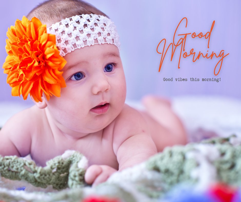 Good Morning Baby Images of an adorable baby wearing a large orange flower headband, gazing curiously, with the cheerful message 'Good Morning - Good vibes this morning!'