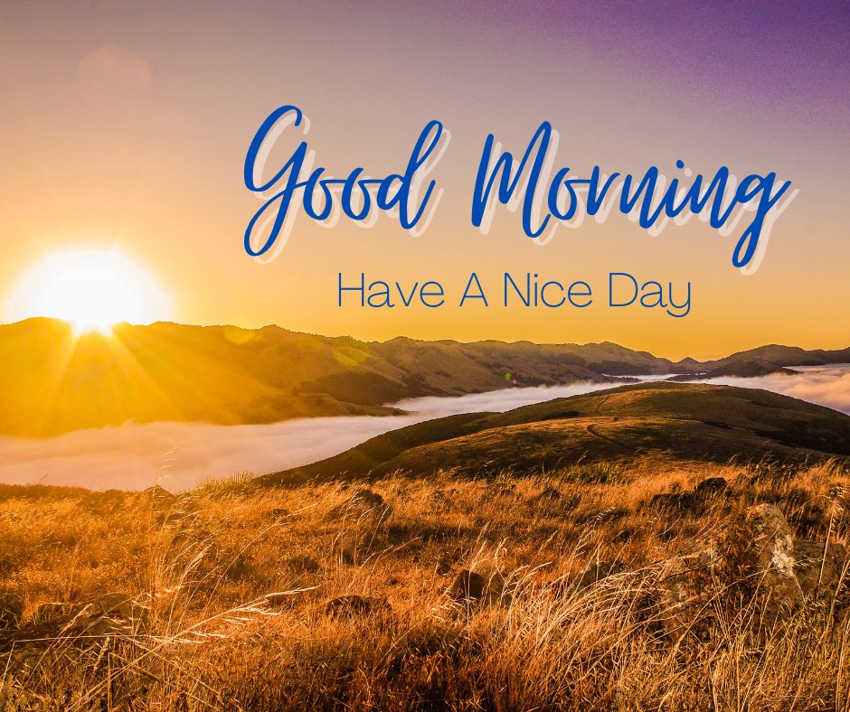 Sweeping landscape of rolling hills and morning mist at sunrise, with Good Morning and Have A Nice Day text in stylish blue font.