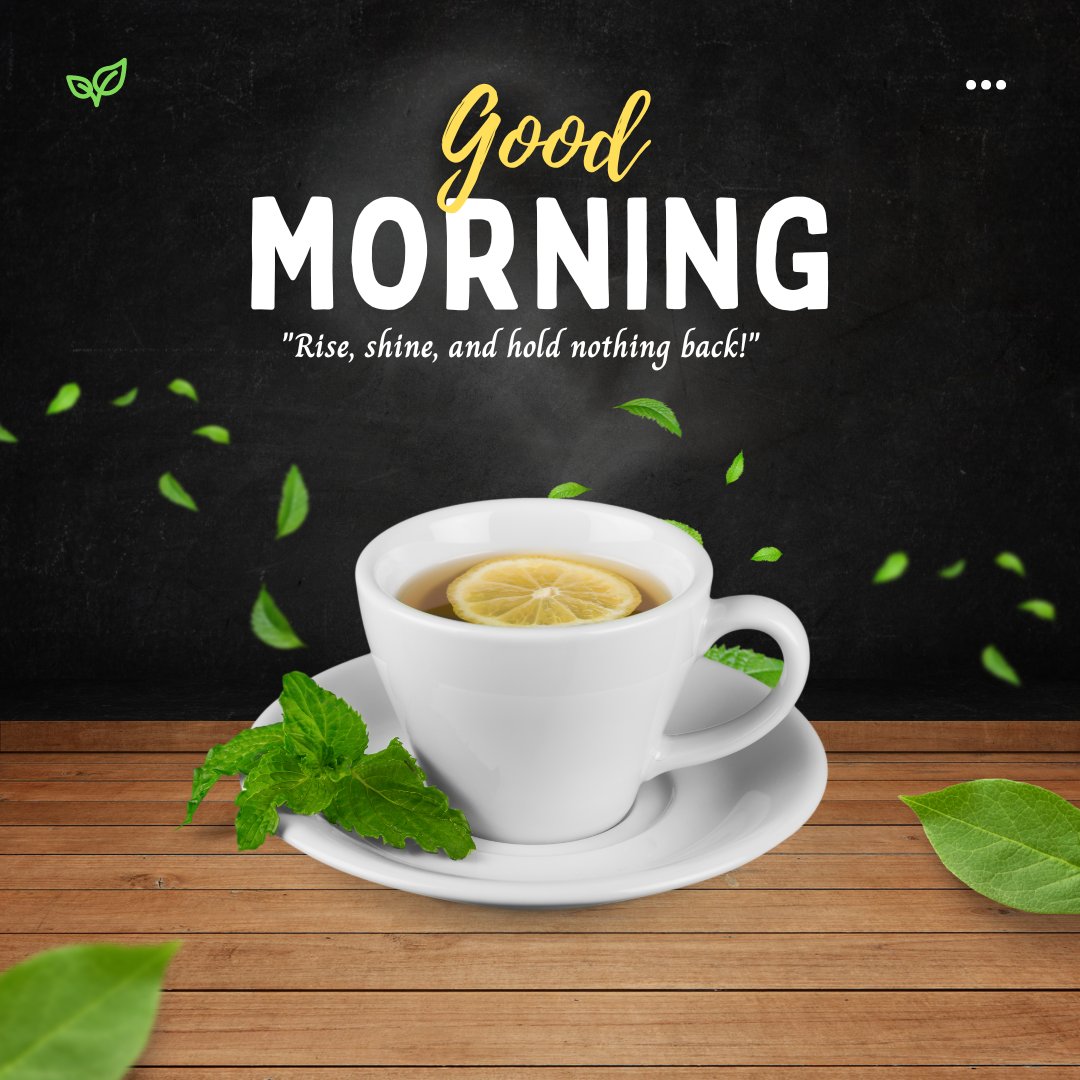 Good morning tea image featuring a cup of tea with a lemon slice, accompanied by fresh mint leaves on a wooden surface against a blackboard background with the text "Good Morning" and "Rise, shine, and hold nothing back!" in elegant yellow script.