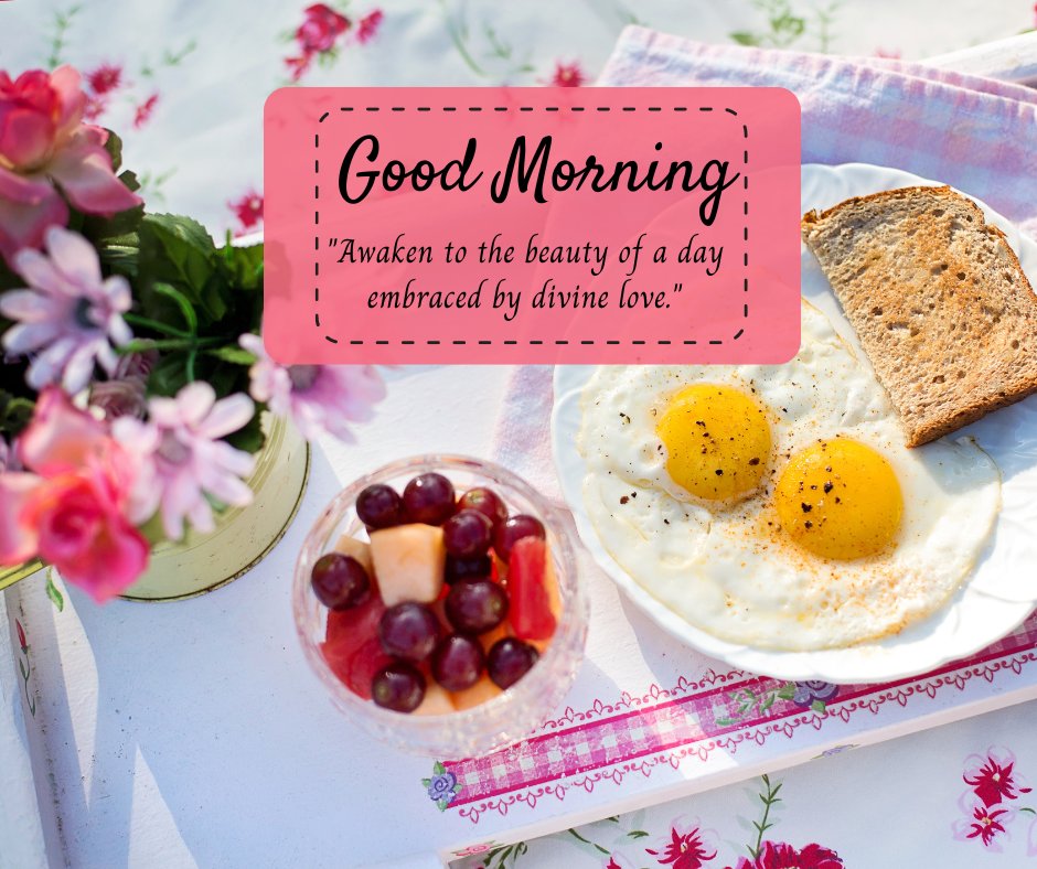 Good morning blessings image featuring a delightful breakfast setting with sunny side up eggs, toasted bread, and a fresh fruit salad, accompanied by pink flowers and a motivational quote about awakening to a day embraced by divine love.