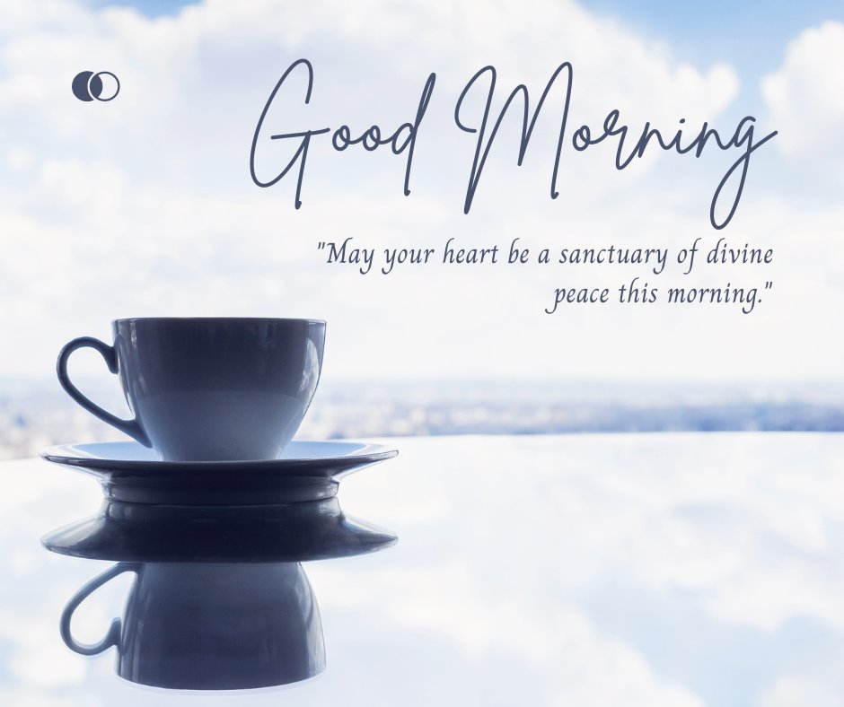 Good morning blessings image of two stacked black coffee cups reflected on a glossy surface, set against a cloudy sky background, accompanied by a quote wishing for your heart to be a sanctuary of divine peace.