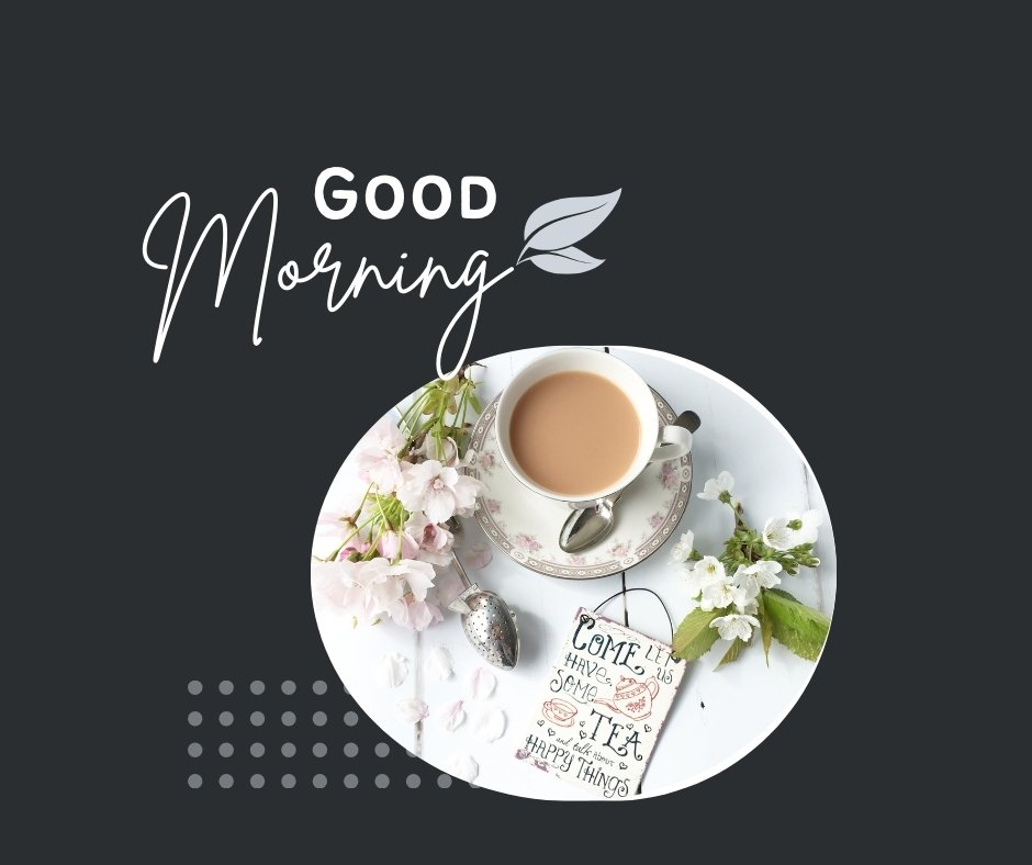 Good morning tea image featuring a stylishly presented cup of tea with milk on a decorative tray, accompanied by blossoming pink flowers and a charming note about tea and happiness, set against a dark grey background.