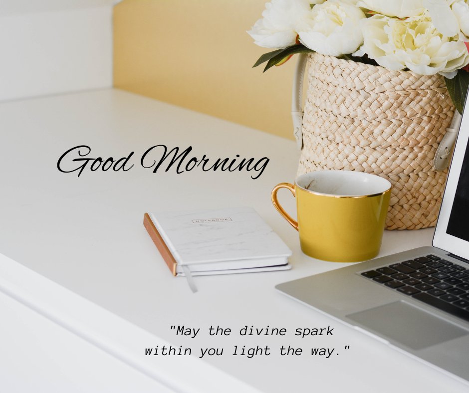 Good morning blessings image with a serene office desk setup featuring a white peony bouquet in a wicker basket, a golden mug, and an open laptop, evoking a calm and productive morning atmosphere.