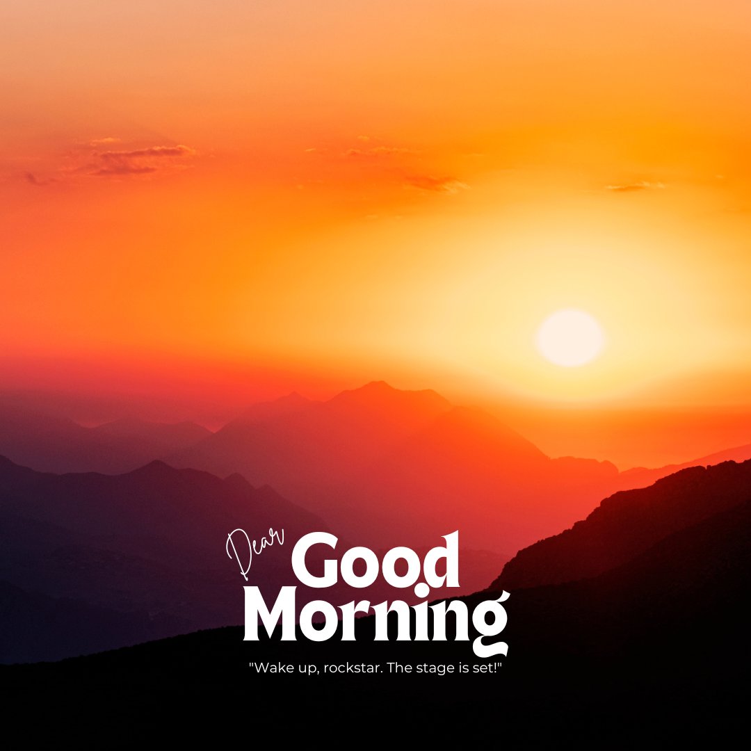 Good morning dear images of a breathtaking sunrise over mountain silhouettes. The sky displays a gradient of orange to deep blue, casting a warm glow over the layered mountain peaks. The phrase 'Dear Good Morning' adds an inspiring touch, perfect for starting the day with enthusiasm and beauty.