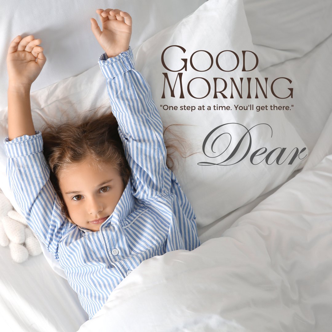 Good morning dear image showing a young girl waking up in a cozy bed, stretching her arms with a hopeful expression, surrounded by soft pillows, emphasizing morning freshness and optimism.