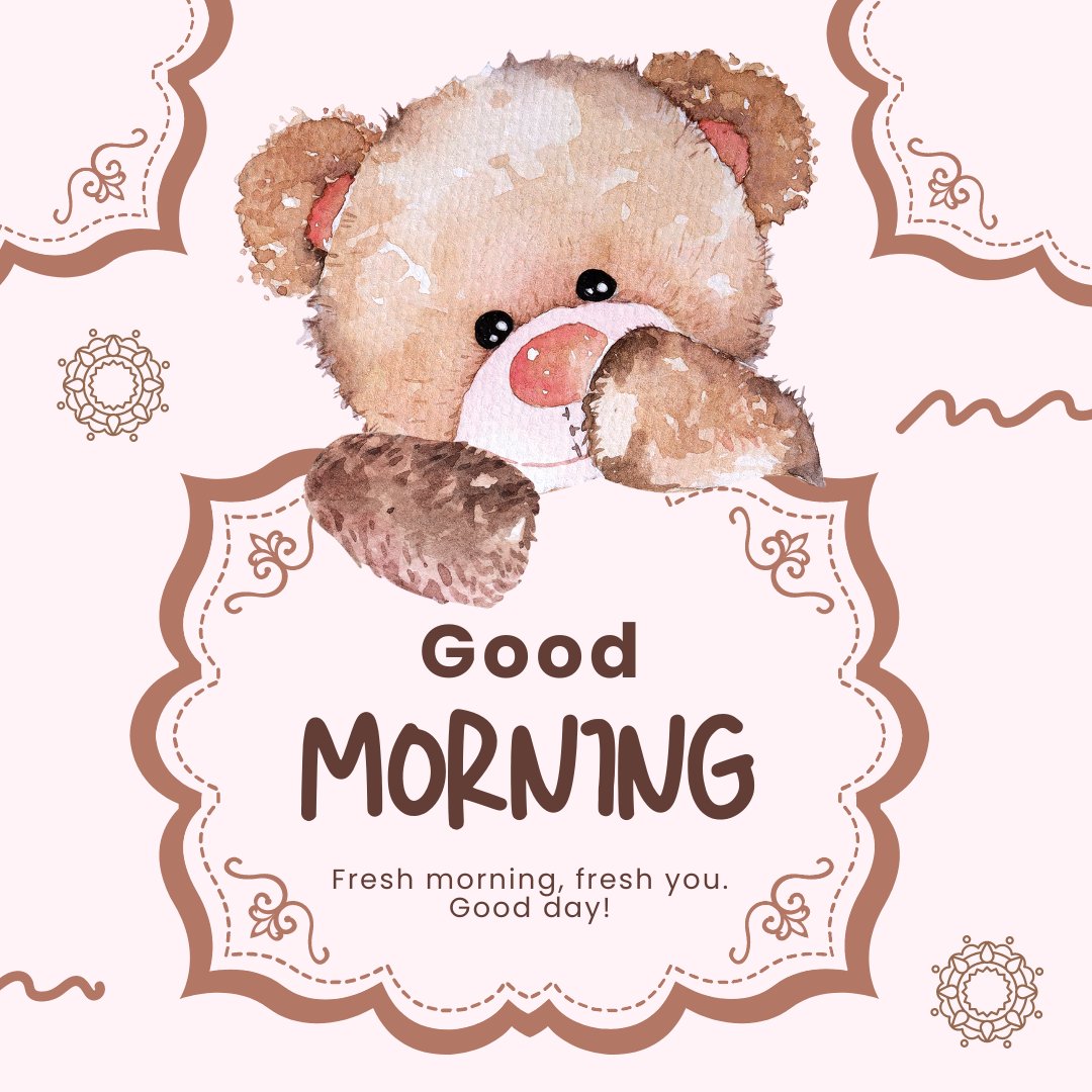 A watercolor illustration of a cute teddy bear peeking over a decorative frame, with the message "Good Morning: Fresh morning, fresh you. Good day!" The background features subtle pink tones and intricate line art, creating a gentle and welcoming image perfect for a morning greeting.