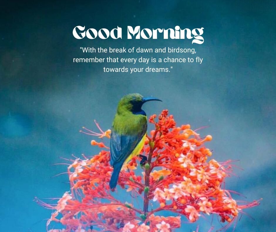 Good Morning Bird Image featuring a green and yellow bird perched on vibrant red and orange flowers against a serene blue background, with the greeting 'Good Morning' and an inspirational quote about seizing the day and flying towards dreams.